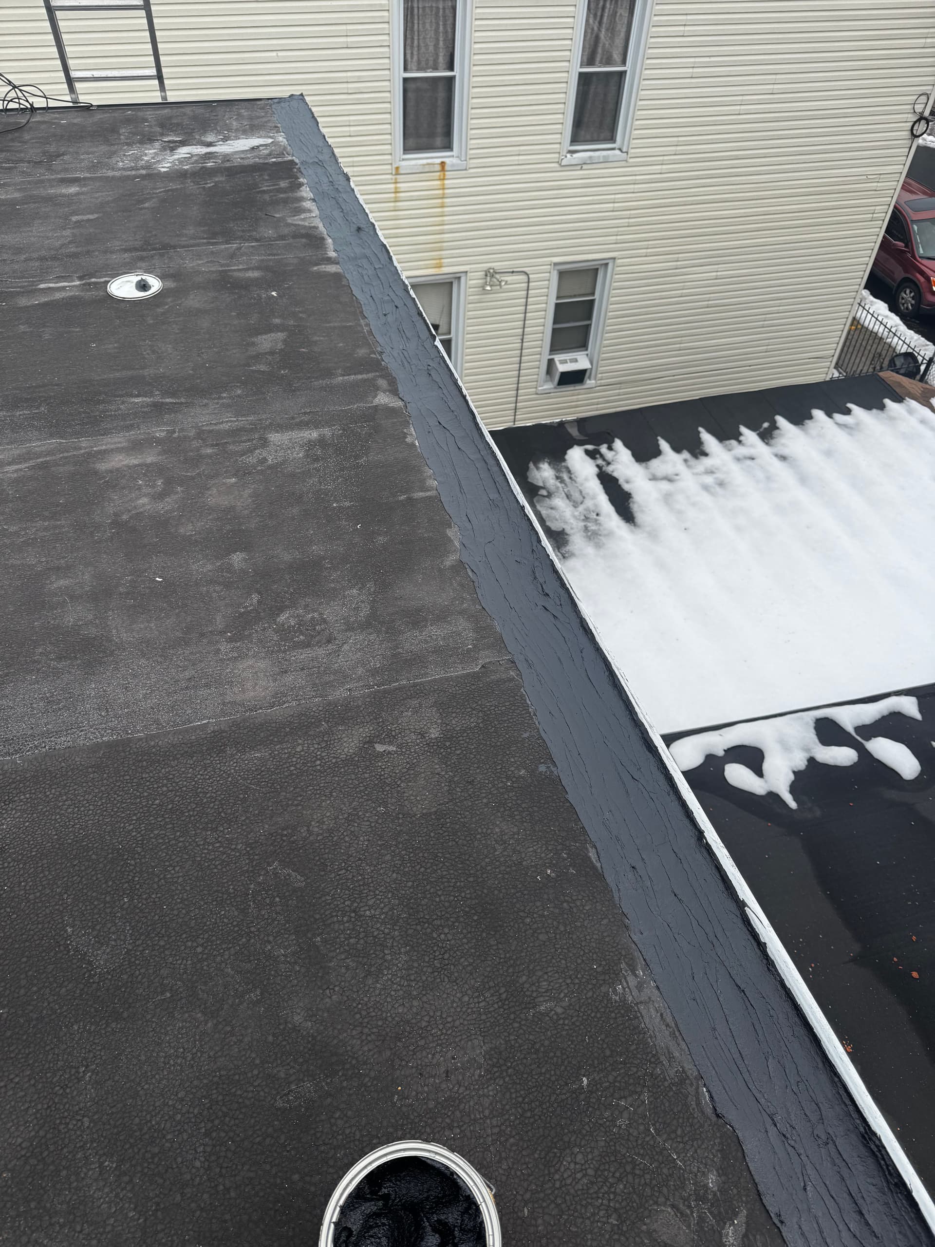 Gallery photos for Flat Roof Reinforcement in Challenging Winter Conditions: Image #1
